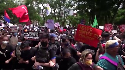 Hundreds protest Marcos' election win in Manila