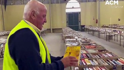 Lifeline Book Fair: Alex Ferguson flicks through some titles