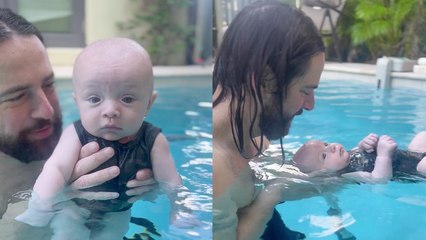 'This video of an infant learning to stay afloat is both IMPRESSIVE & PEAK CUTENESS '