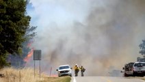 Evacuations continue as wildfires burn 30,000 acres in just 24 hours