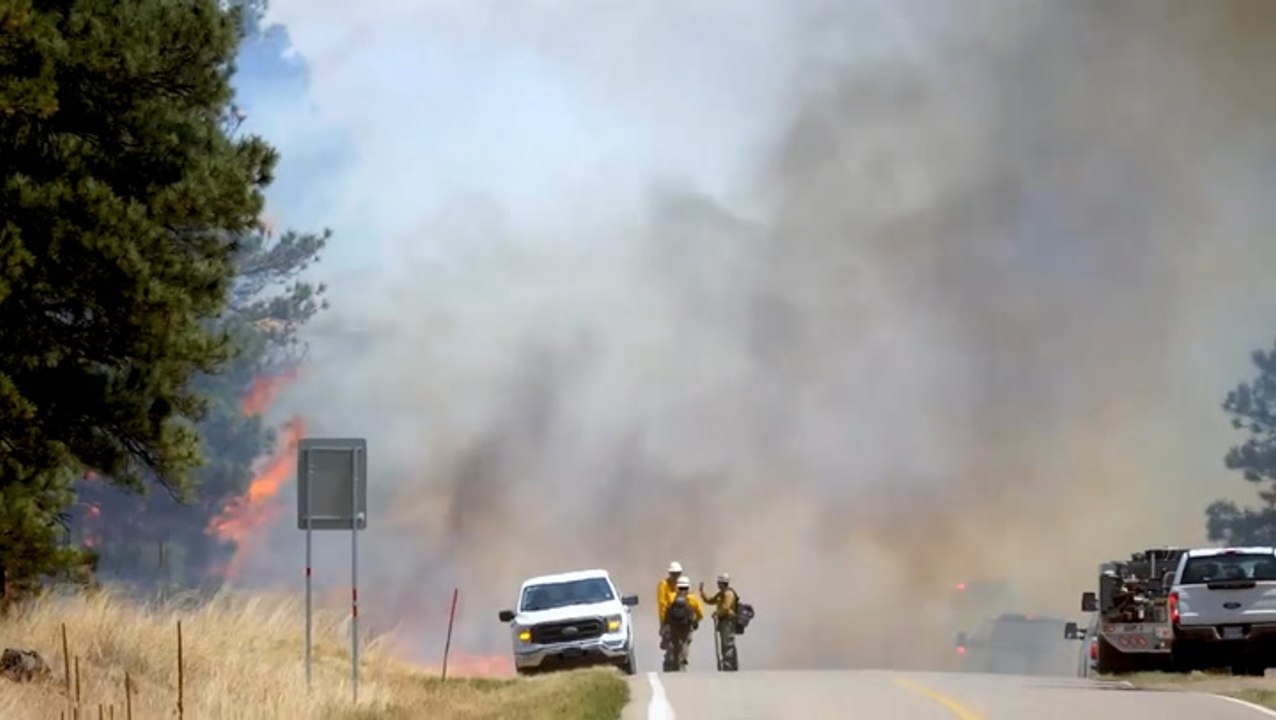 Evacuations continue as wildfires burn 30,000 acres in just 24 hours
