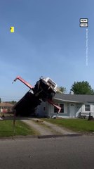 Crane Truck Malfunctions, Crashes Onto House