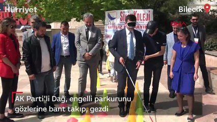 AK Parti'li Dağ, engelli parkurunu gözlerine bant takıp, gezdi