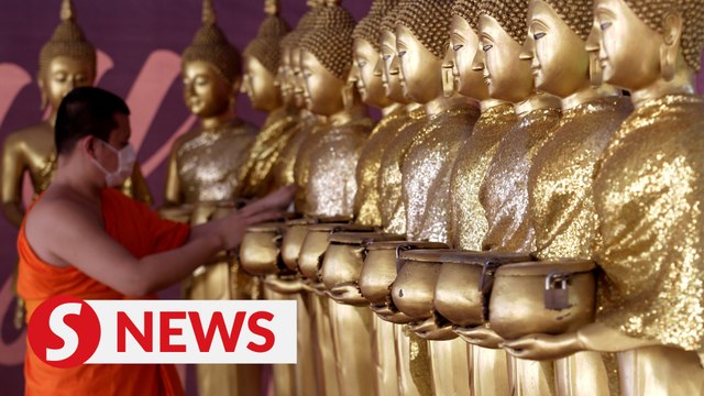 Devotees return to Buddhist temples for Wesak Day celebration