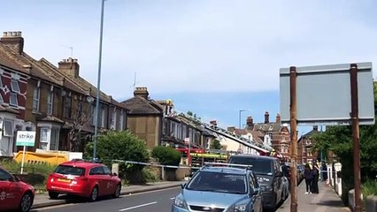 Crews at the scene of a house fire in Gravesend