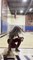 Woman Shoots Basketball Backward Into Basket