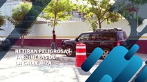 Retiran peligrosas jardineras de la calle Niza | CPS Noticias Puerto Vallarta