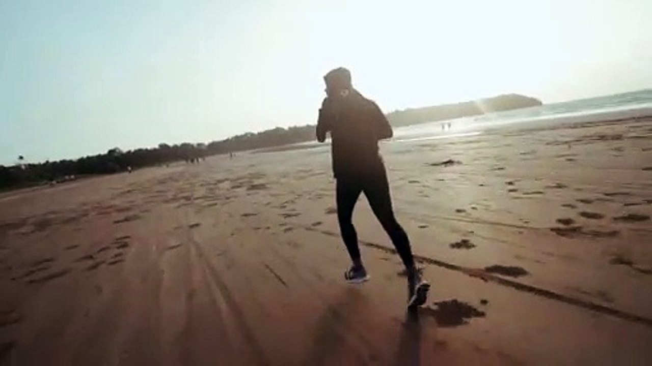 video corrida na areia