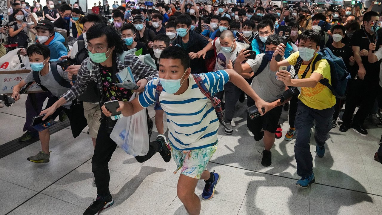 Hong Kong railfans flock to take first train of new cross-harbour rail