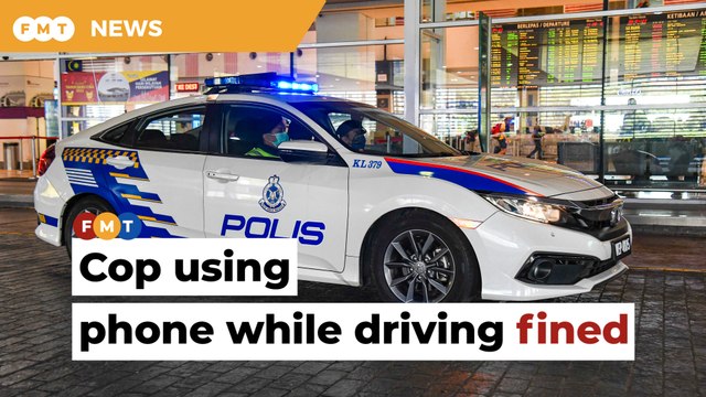 Cop fined for using phone while driving