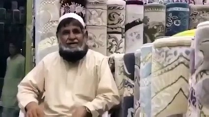 Sheikh Mohamed bin Zayed visits a carpet seller