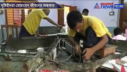 Blind workers makes candles