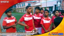 Footballer Avijit Mandal and Arnab Mandal distribute sweets and clothes to needy children before puja