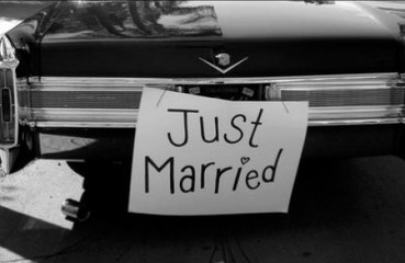 Kourtney Kardashian and Travis Barker share their first wedding photos