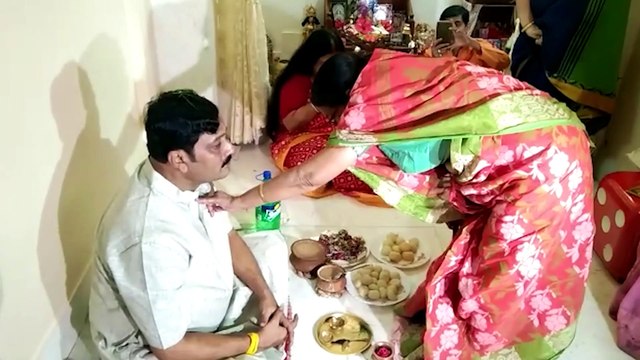 TMC MLA Ratna Chatterjee and BJP leader Rahul Sinha celebrate Bhai Phonta