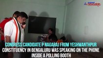 Karnataka Assembly by-polls: Congress candidate uses phone inside Bengaluru polling booth; man click