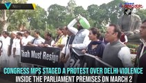 ‘Shah must resign’: Congress , AAP, TMC protest against Delhi violence inside Parliament premises