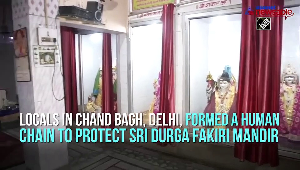 Chand Bagh locals form human chain to protect temple amid violence in Northeast Delhi