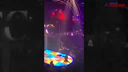 Stripper falls from 20-feet high pole and continues to perform