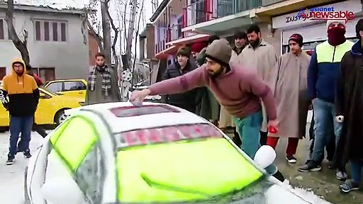 Car sculpture made of snow leaves Kashmiris awestruck