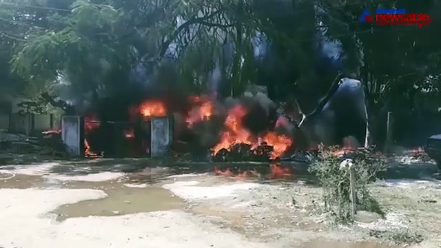 Electric wire comes in contact with tree to create a massive fire