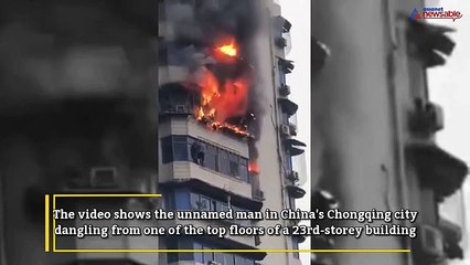 Caught on cam: Man found hanging from a burning apartment