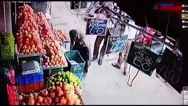 Traffic police demanding money from a fruit shop vendor, caught on CCTV