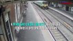 Every parent's worst nightmare:  Pram rolls off railway platform in front of speeding freight train