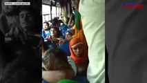This bus conductor jumps around seats collecting tickets, putting even a monkey to shame
