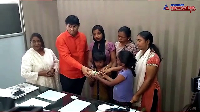 BBMP Pourakarmika Subramani's family receive Rs 2 lakh cash from JD(S) leader Imran Pasha
