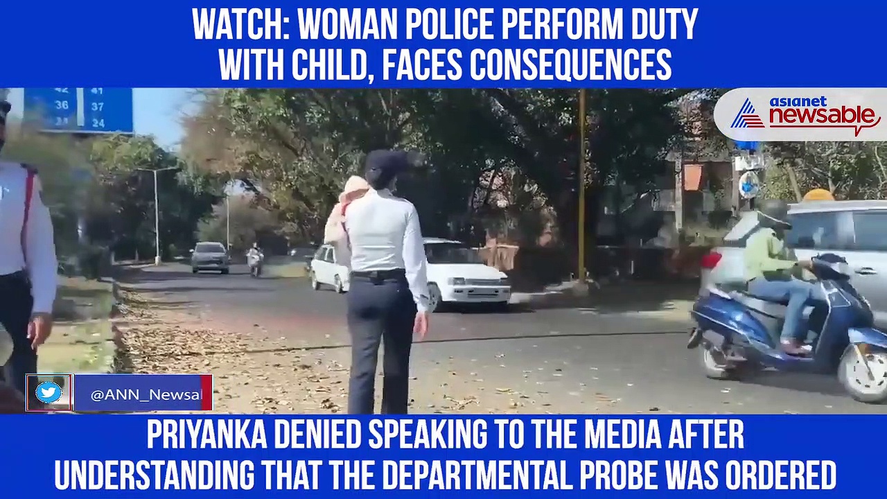 Woman Traffic cop performs duty with a newborn, faces departmental probe