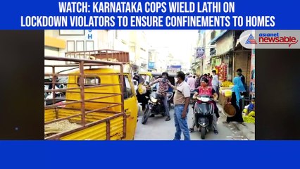 Tải video: Watch: Karnataka cops wield lathi on lockdown violators to ensure confinements to homes