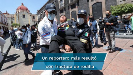 Policías agreden a periodista de EL UNIVERSAL durante marcha de comunidad gay en Toluca