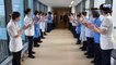 NHS staff applaud Steve as he is discharged