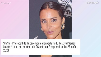 Shy'm maman : Son jeune fils lui grimpe dessus, adorable câlin dans l'herbe