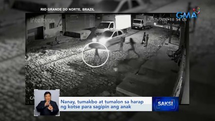 Nanay, tumakbo at tumalon sa harap ng kotse para sagipin ang anak | Saksi