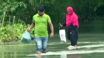Decena de muertos y 2 millones de personas aisladas por inundaciones en Bangladés