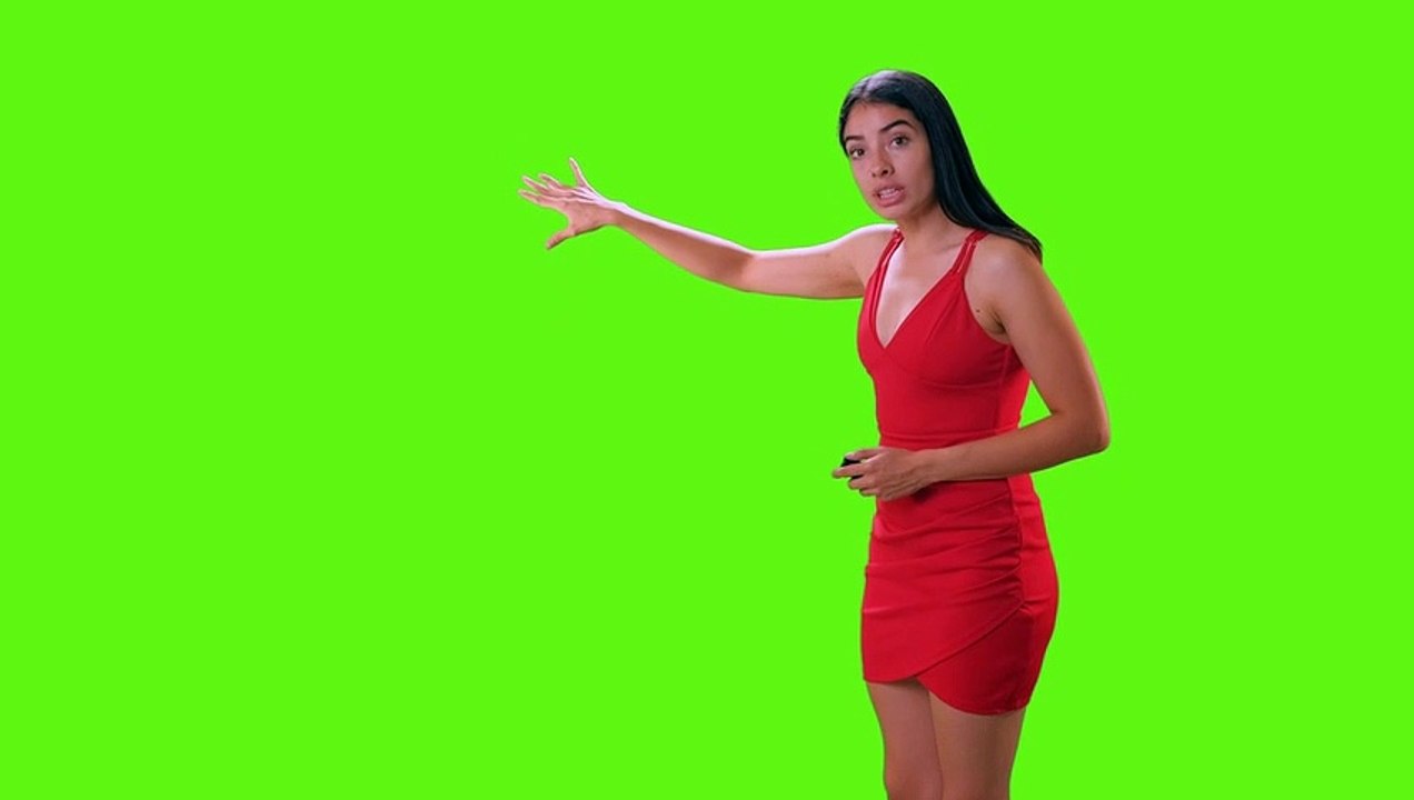 Young woman giving a presentation on a green screen