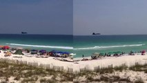 'Beachgoers left in awe as a superfast Blue Angels aircraft flies VERY close to the beach '