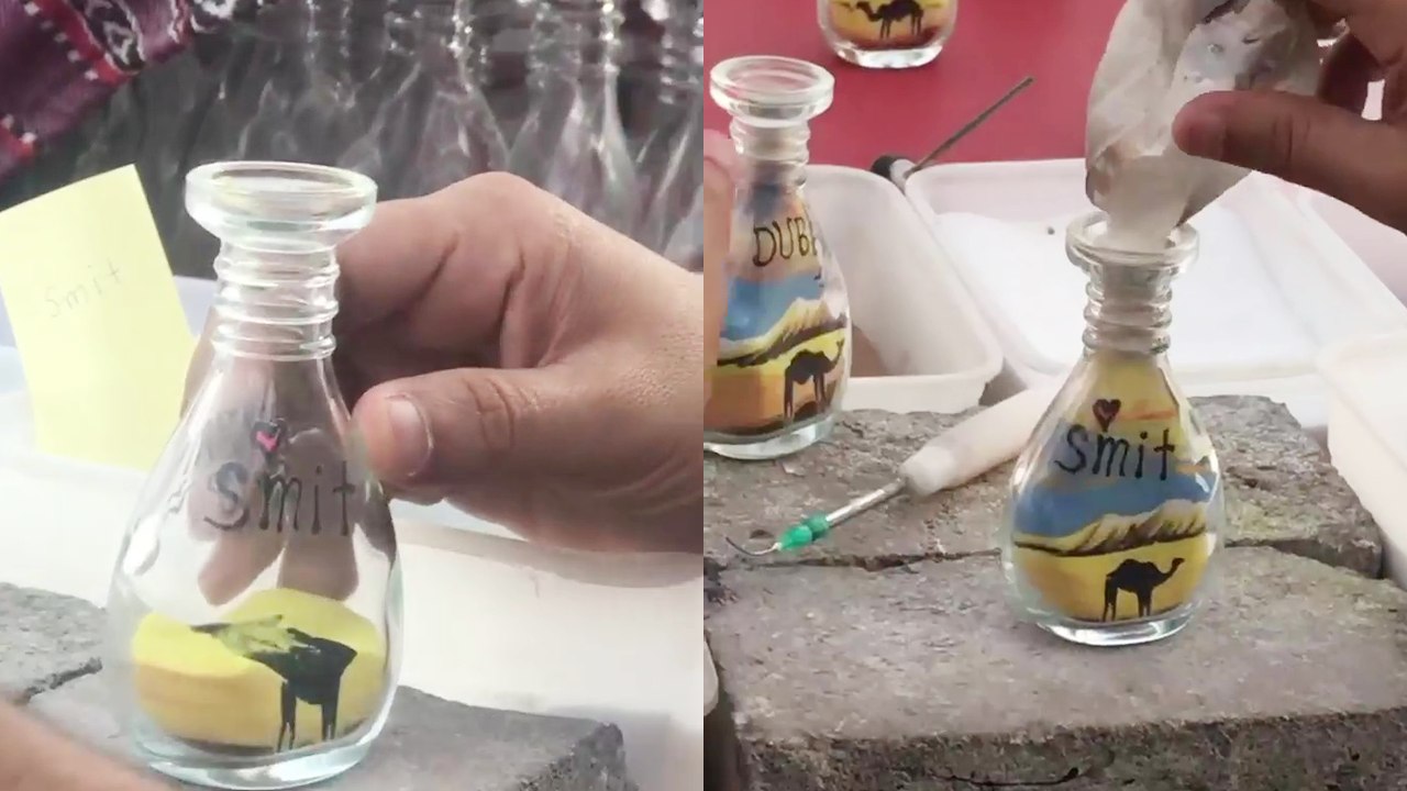 'UAE artist creates a beautiful, detailed bottled sand art of a camel in a desert '