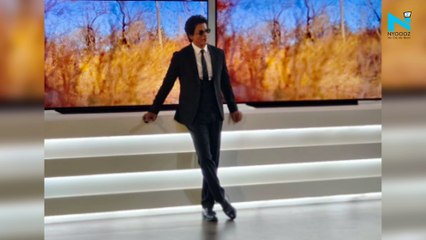 Shah Rukh Khan leaves the crowd cheering as he strikes his signature pose at Delhi event