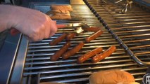 Tank Cooks Hot Dogs on the Grill