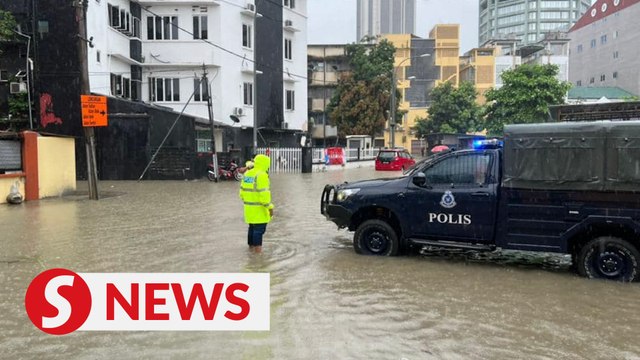 Flash floods hit several major roads in KL