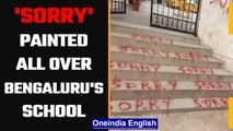 'Sorry' in red, bold letters painted all over Bengaluru school's walls, nearby streets|OneIndia News