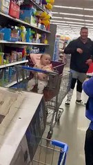 Baby Bursts Out Laughing at Game of Frisbee