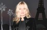 Kate Moss has denied a rumour that her ex Johnny Depp once pushed her down the stairs