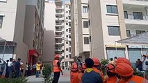 भूकंप के झटकों के बीच आवासीय बिल्डिंग में लगी आग, कई लोग फंसे, एनडीआरएफ के साथ दौड़ी एंबुलेंस व फायर ब्रिगेड