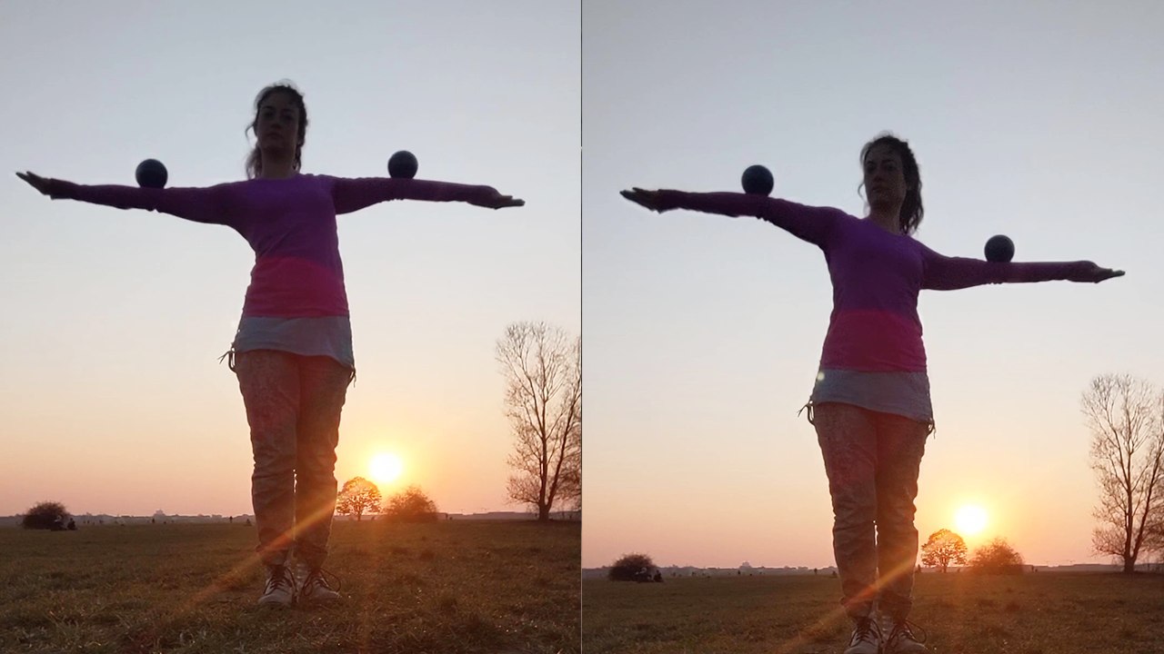 'Woman puts on a mesmerizing contact juggling performance during sunset '