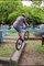 Guy Performs Incredible Bicycle Trick Across Obstacle Course At Bike Park