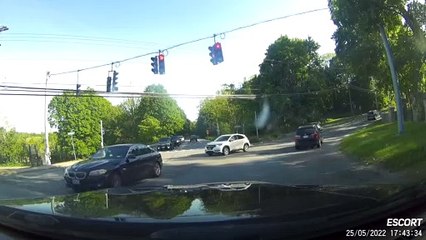 Cars Have a Head on Collision at Intersection Sparking Fire